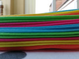 Vibrant coloured fabric bunting - #playroom #festival #citrus #sunburst