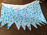Pale blue fabric bunting with bright turquoise stars