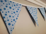 Pale blue fabric bunting with bright turquoise stars