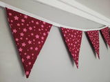 Dark red fabric bunting with pink stars