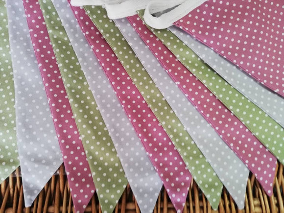 Spotty bunting, dusky pink, sage green and dove grey.