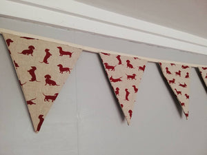 Sausage dog bunting ! Dark red dogs in a variety of poses on a natural background fabric. #sausagedoggifts #sausagedog