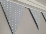 Pale blue cotton bunting with small white stars