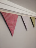 Spotty bunting, dusky pink, sage green and dove grey.