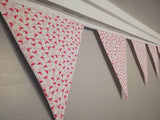 Pink flamingo fabric bunting, on an off white background, approx 2.5 metres