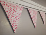 Pink flamingo fabric bunting, on an off white background, approx 2.5 metres