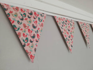 Chirpy bird fabric bunting. Lovely green, pink and brown birds design on a soft pink background, 10 flags, approx 2.5 metres.