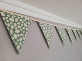 Green fabric bunting with lovely egg design. 10 flags, approx 2.5 metres