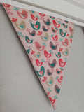 Chirpy bird fabric bunting. Lovely green, pink and brown birds design on a soft pink background, 10 flags, approx 2.5 metres.