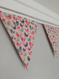 Chirpy bird fabric bunting. Lovely green, pink and brown birds design on a soft pink background, 10 flags, approx 2.5 metres.