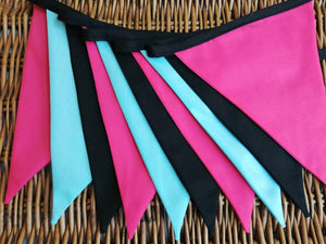 Cerise pink, turquoise and black fabric bunting - great background prop !