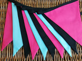 Cerise pink, turquoise and black fabric bunting - great background prop !