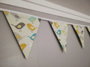 Bird fabric bunting, in a mix of Grey's, yellows and blues. 10 flags, approx 2.5 metres