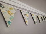 Bird fabric bunting, in a mix of Grey's, yellows and blues. 10 flags, approx 2.5 metres