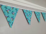 Hummingbird fabric bunting, turquoise background with pretty pink, blue and green design. 10 flags, approx 2.5 metres