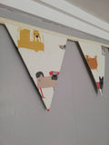 Stylistic dogs Fabric Bunting, on a cream background. 10 flags, approx 2.5 metres