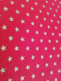 Gold star fabric bunting on red background, approx 2.5 metres