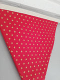 Gold star fabric bunting on red background, approx 2.5 metres