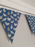 Chicken fabric bunting. Blue cotton with black and white chicken design, 10 flags, approx 2.5 metres.