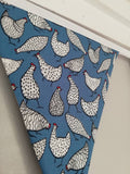 Chicken fabric bunting. Blue cotton with black and white chicken design, 10 flags, approx 2.5 metres.