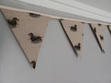 Sausage dogs fabric bunting, on natural background, 10 flags, approx 2.5 metres